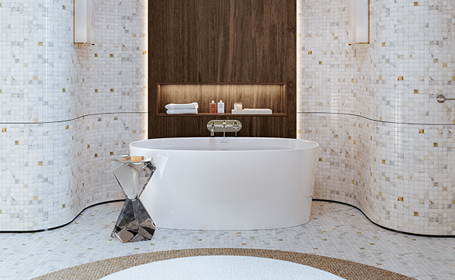 A bathtub fitted with a three-hole wall-mounted bath faucet in a beige bathroom with a beige wall.